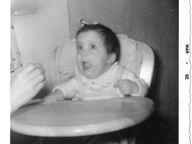 1961 Zann being fed.jpg